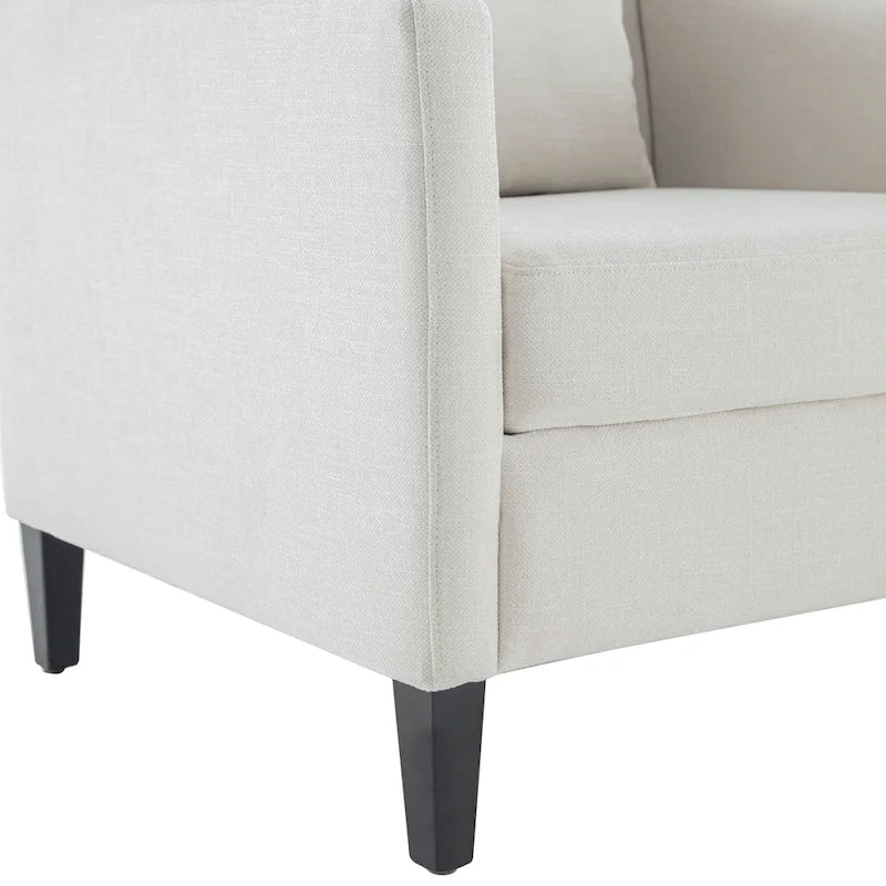 Fauteuil club confortable avec pouf et oreiller