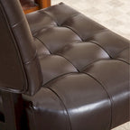 Fauteuil capitonné surdimensionné
