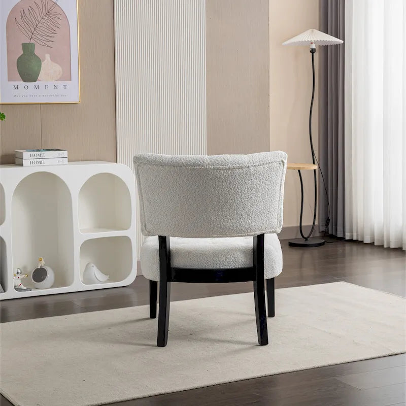 Fauteuil capitonné surdimensionné