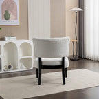 Fauteuil capitonné surdimensionné