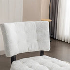 Fauteuil capitonné surdimensionné