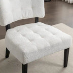 Fauteuil capitonné surdimensionné
