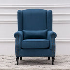 Fauteuil capitonné à oreilles avec clous de tapissier