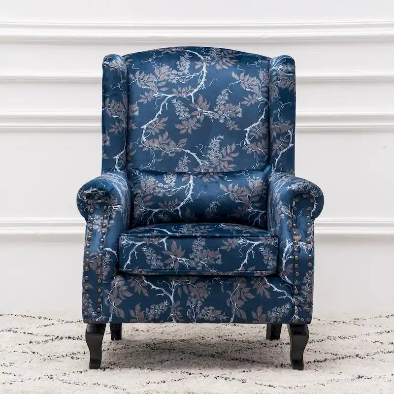 Fauteuil capitonné à oreilles avec clous de tapissier