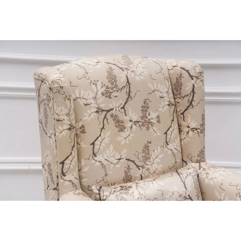Fauteuil capitonné à oreilles avec clous de tapissier