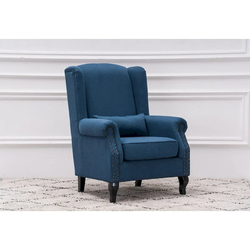Fauteuil capitonné à oreilles avec clous de tapissier